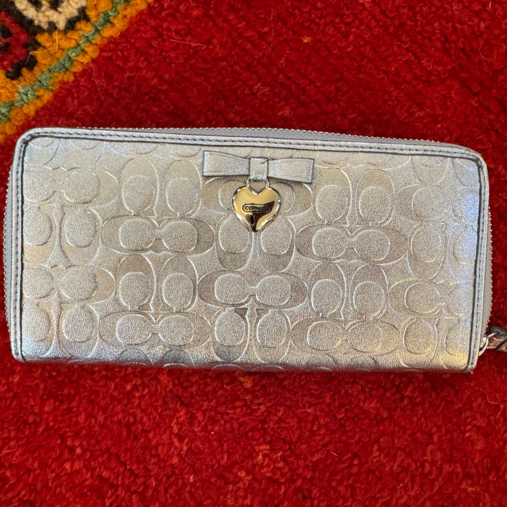 Coach Silver Embossed Clutch with Heart Detail